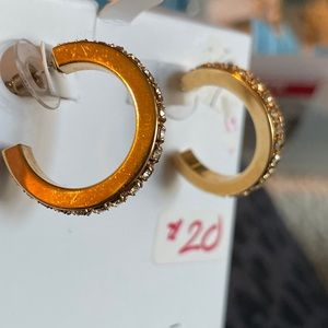 Gold hoop earrings with champagne color crystals